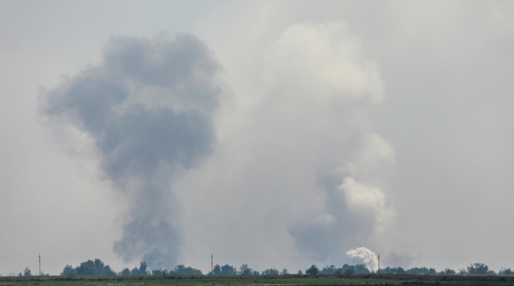 A view shows smoke rising above the area following an alleged explosion in the village of Mayskoye in the Dzhankoi district, Crimea, August 16, 2022. REUTERS/Stringer