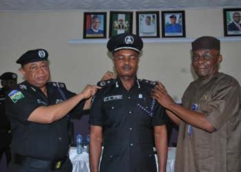 AIG Lawan Jimeta, AIG zone 5, decorating some of the newly promoted senior officers in the zonal headquarters on Tuesday.