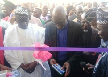 Sen. Istifanus Gyang (PDP-Plateau) inaugurating and furnished block of three lecture halls, library and two office accommodation at ECWA Theological College