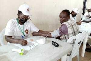 One of the beneficiaries being attended to by a medical expert.