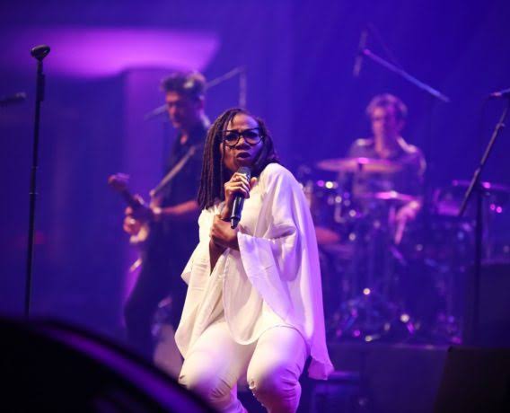 Asa performing on stage.