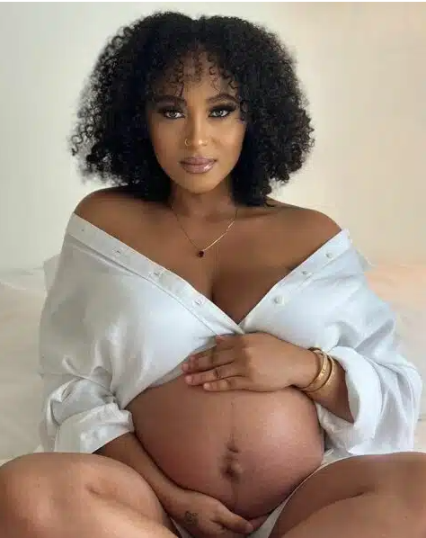 Rosy Meurer reveals pregnancy bump after months of keeping it secret from the public