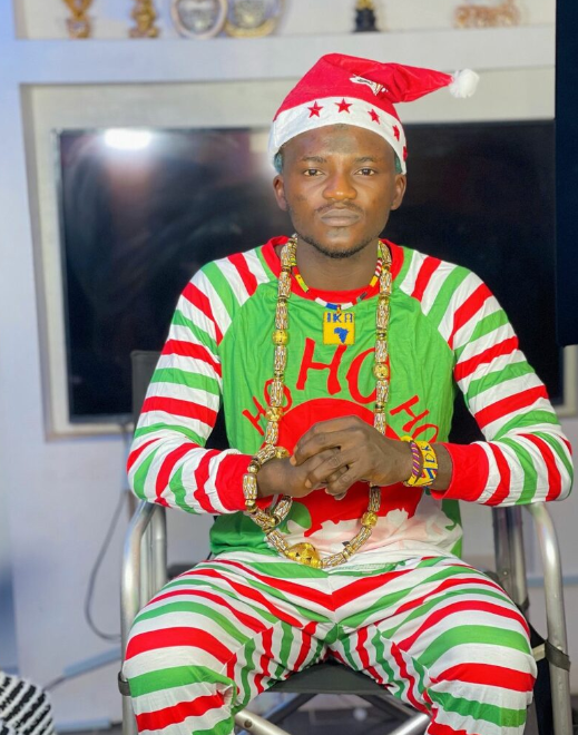 Controversial singer Portable displays fatherly love, showcases Christmas outfits for his boys