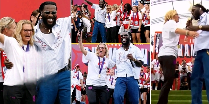 Euro 2025 Trophy Parade: Burna Boy surprises England Women’s coach Sarina Wiegman on stage (VIDEO)