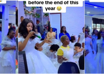 Nigerian single ladies wear wedding gowns to church in prayer for husbands