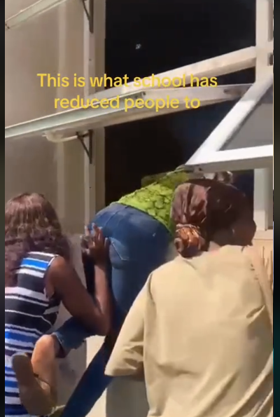 Nigerian students cause buzz as they sneak into lecture room.