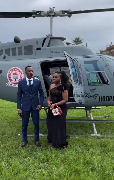 Secondary school students arrive in helicopter and convoy for graduation celebration