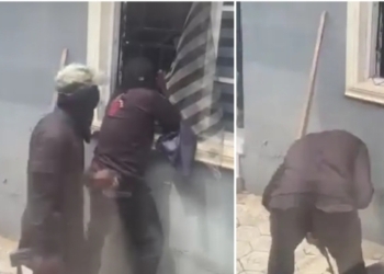 Police officers forcing entry Ekiti residence