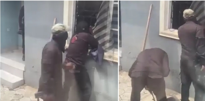 Police officers forcing entry Ekiti residence