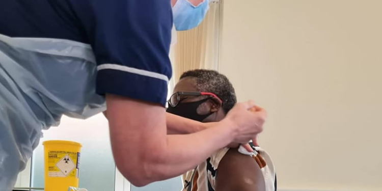Pastor Matthew Ashimolowo receiving COVID-19 vaccine
