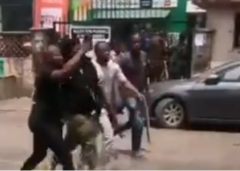 Accused police officer being chased by mob
