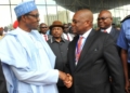 L-R: President Muhammadu Buhari, Senator Orji Uzor Kalu