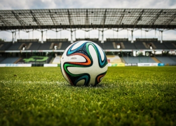 (Source: https://pixabay.com/photos/soccer-ball-stadium-field-488700/)