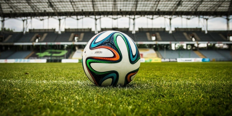 (Source: https://pixabay.com/photos/soccer-ball-stadium-field-488700/)
