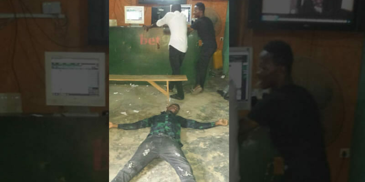 Depict image - man collapses at a betting shop in Nigeria