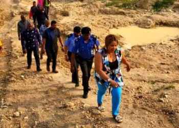 Government officials on inspection of the scene.