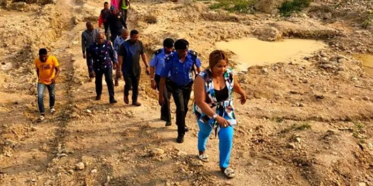 Government officials on inspection of the scene.