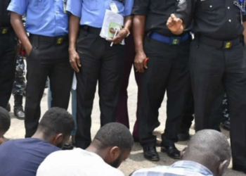 suspects paraded by police