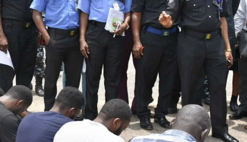 suspects paraded by police