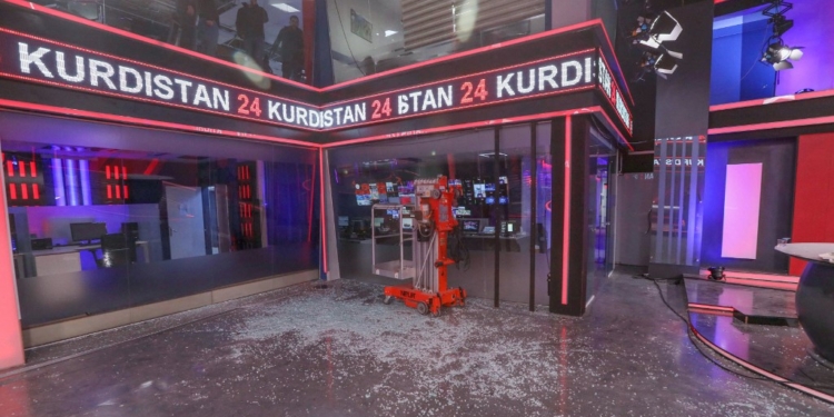 A picture taken on March 13, 2022, shows a view of the damaged studio at the Kurdistan 24 TV building, after an overnight attack in Arbil, the capital of the northern Iraqi Kurdish autonomous region. - A dozen ballistic missiles targeted Iraq's northern city of Arbil, including US facilities, causing damage but no major casualties early, security forces in the autonomous Kurdistan region said. (Photo by SAFIN HAMED / AFP)