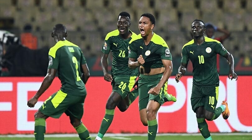 Senegal's defender Abdou Diallo (2ndR) celebrates after scoring his team's first goal during the Africa Cup of Nations (CAN) 2021 semi final football match between Burkina Faso and Senegal at Stade Ahmadou-Ahidjo in Yaounde on February 2, 2022. (Photo by CHARLY TRIBALLEAU / AFP) (Photo by CHARLY TRIBALLEAU/AFP via Getty Images)