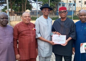 Labour Party National Chairman, Barrister Julius Abure handing over the Certificate of Return to Hon Chuma Nzeribe, candidate for the Anambra South Senatorial election. Flanked by the National Legal Adviser, Barrister Kehinde Edun (left), Deputy National Chairman Chief Clement Ojukwu (right) and National Secretary, Alhaji Umar Farouk Ibrahim.