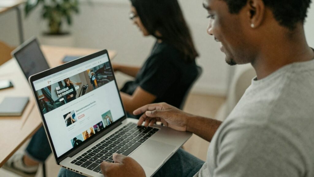 Person testing a website on a laptop.