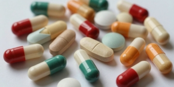 Probiotic supplements in capsules and tablets.