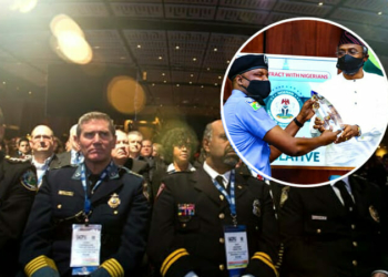 Law enforcement officers at the International Association of Chiefs of Police Annual Conference and Exposition in Chicago on October 27, 2015. (INSET - DCP Abba Kyari receiving award of honor from Federal House of Reps)