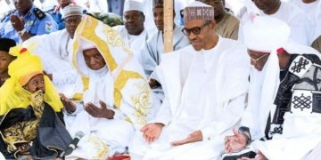 President Muhammadu Buhari in a Prayer session