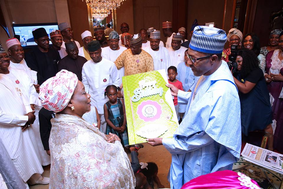 Photos: Former first ladies, Maryam Abacha & Fati Abdulsalam Abubakar, present President Buhari a birthday card at his surprise get together