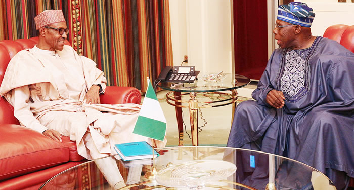 Former President Olusegun Obasanjo in a meeting with President Muhammadu Buhari