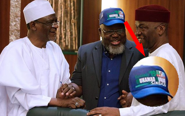 Communications minister, Adebayo Shittu (middle) wearing the Buhari’s re-election campaign cap on Wednesday ... in Abuja