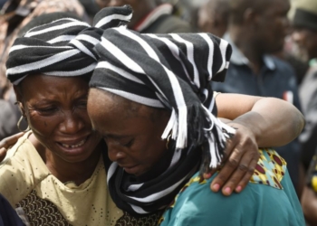 Women mourning after killer herdsmen attack