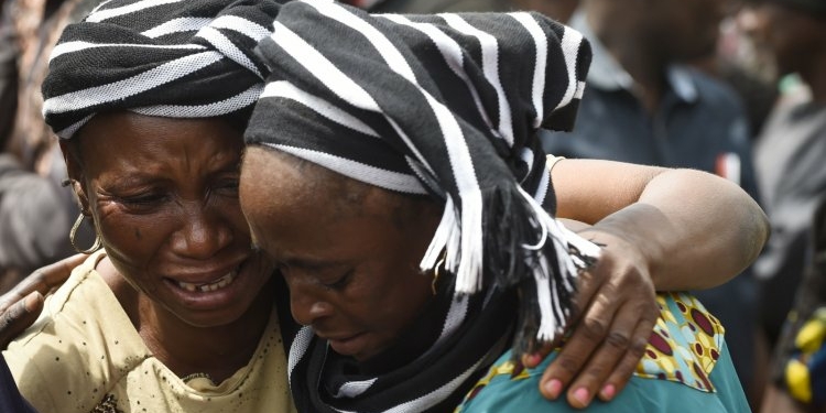 Women mourning after killer herdsmen attack