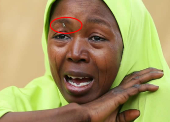 One of the parents of abducted Dapchi Schoolgirls weeping.