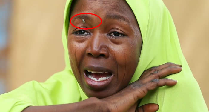 One of the parents of abducted Dapchi Schoolgirls weeping.