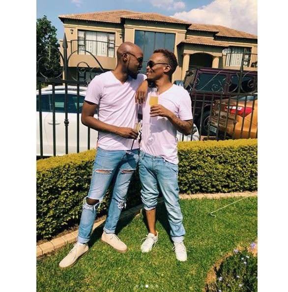 South African gay media personality, ?Somizi shows off his man as they step out in matching outfits (Photos)