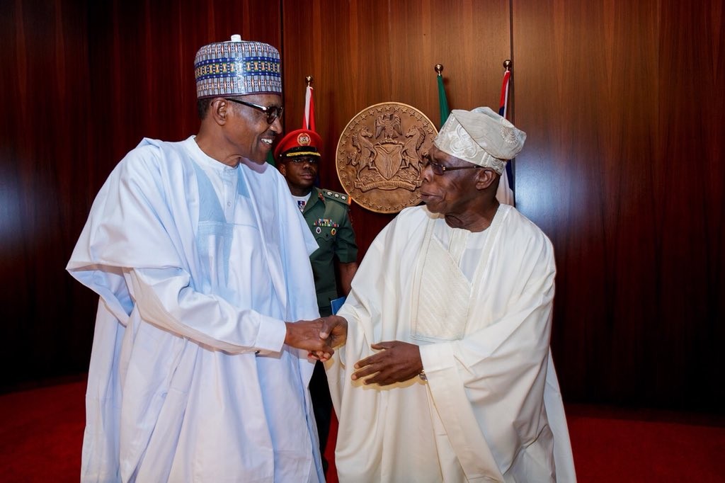 Photos: See the rare moment President Buhari came face to face with one of his worst critics, Governor Fayose 