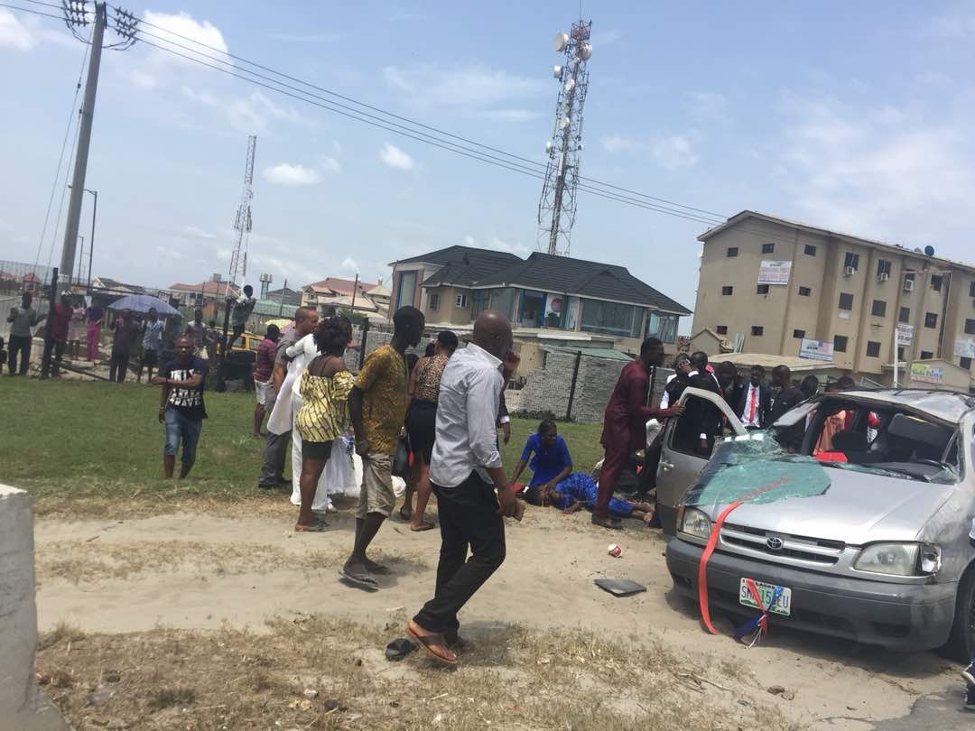 Photos: Groom feared dead as couple returning from their church wedding involved in a ghastly motor accident in Lagos