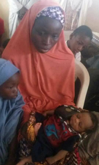 Nigerian woman allegedly gives birth to baby with Quran and prayer beads in his hand (photos)