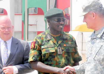 PIC.23. FROM LEFT: U.S AMBASSADOR TO NIGERIA, AMB. JAMES ENTWISTLE; CHIEF OF AMRY STAFF, LT.-GEN. TUKUR BURATAI AND COMMANDER, US AFRICOM. GEN. DAVID RODRIGUEZ, AT THE INAUGURATION OF UNITED STATES OF AMERICA TRAINING ASSISTANCE TO SELECTED UNITS OF THE NIGERIAN ARMY, IN JAJI KADUNA