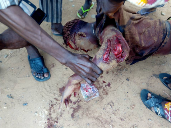 Man hacked to death by cultists following argument during a football match in Ogun state (graphic photos)