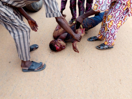 Man hacked to death by cultists following argument during a football match in Ogun state (graphic photos)