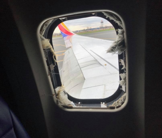 Flight Horror! One dead,?woman almost sucked out of a plane window after engine exploded at?32,000ft (Photos)