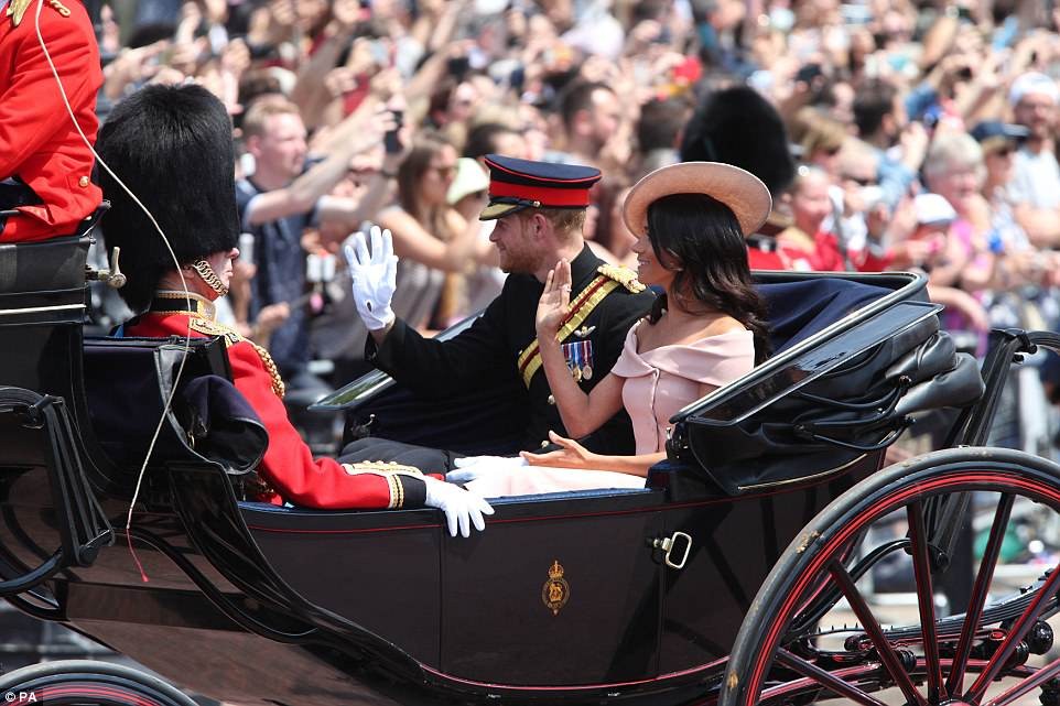 Meghan makes her first balcony appearance at Buckingham Palace as she joins the Queen to celebrate her official 92nd birthday (Photos)