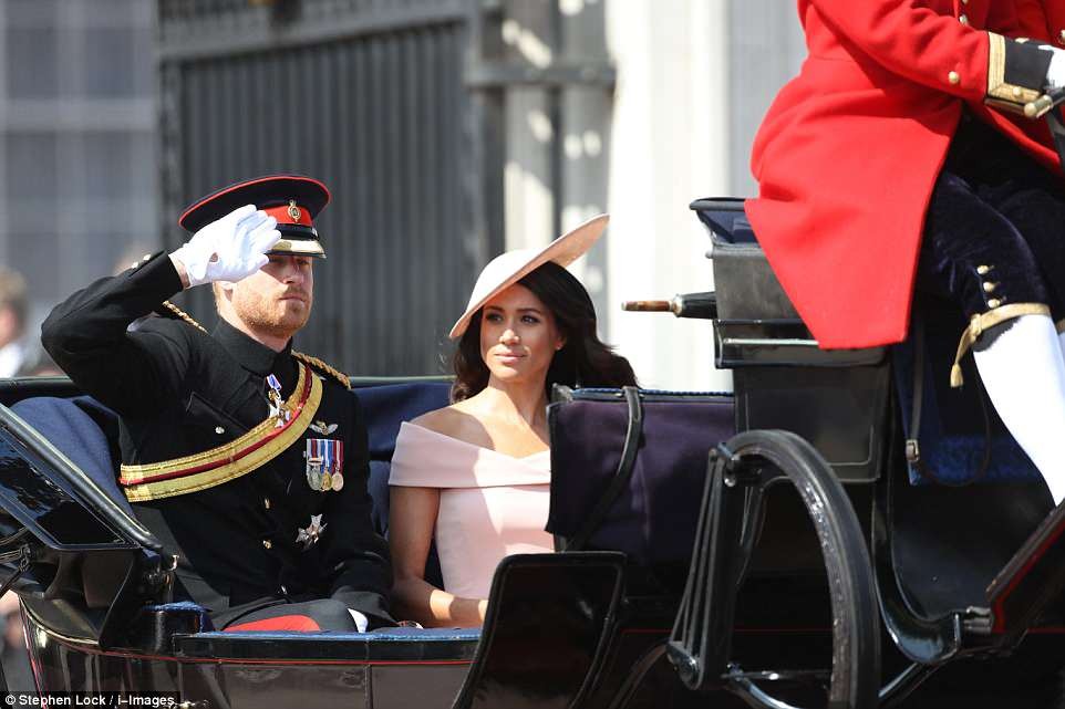 Meghan makes her first balcony appearance at Buckingham Palace as she joins the Queen to celebrate her official 92nd birthday (Photos)