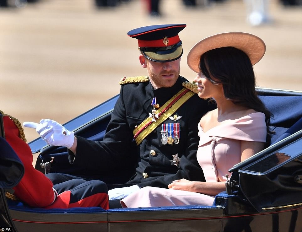 Meghan makes her first balcony appearance at Buckingham Palace as she joins the Queen to celebrate her official 92nd birthday (Photos)