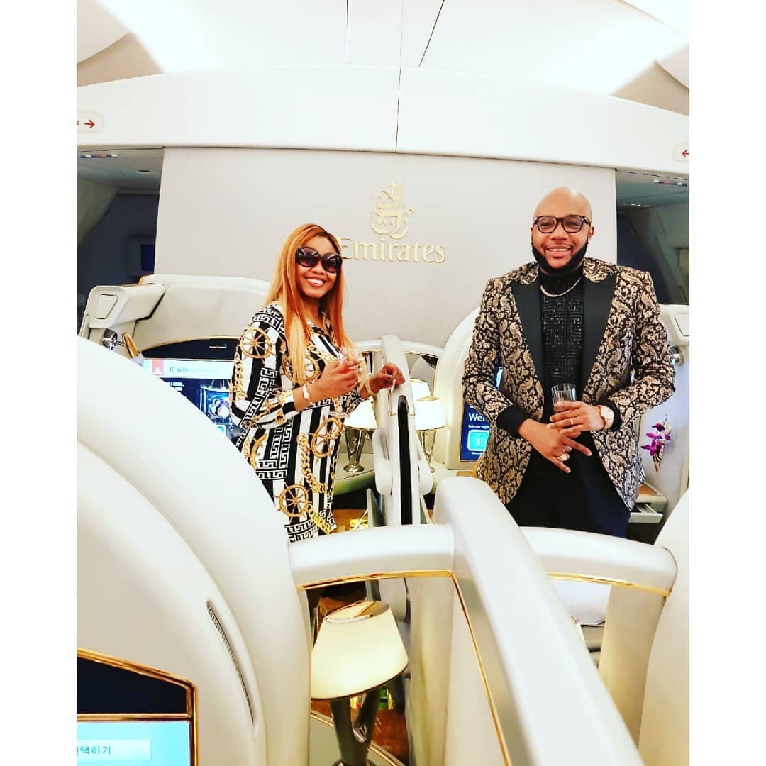 Nigerian millionaire E-money and wife celebrate good times as they fly out of the country (Photos)