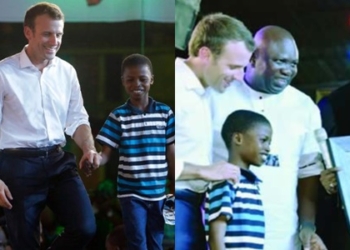 French President Emmanuel Macron, left, walk on the stage with 11 years -old, Kareem Waris Olamilekan, right, a young Nigerian artist who drew President Macron, Portarit, left,  during  an event to celebrate African Culture at the New  Afrika shrine in Lagos, Nigeria, Tuesday, July 3, 2018. Macron  arrived  Abuja  earlier for a meeting with his Nigerian counterpart Muhammadu Buhari, in his latest attempt to forge closer ties with English-speaking Africa. (AP Photo/Sunday Alamba)